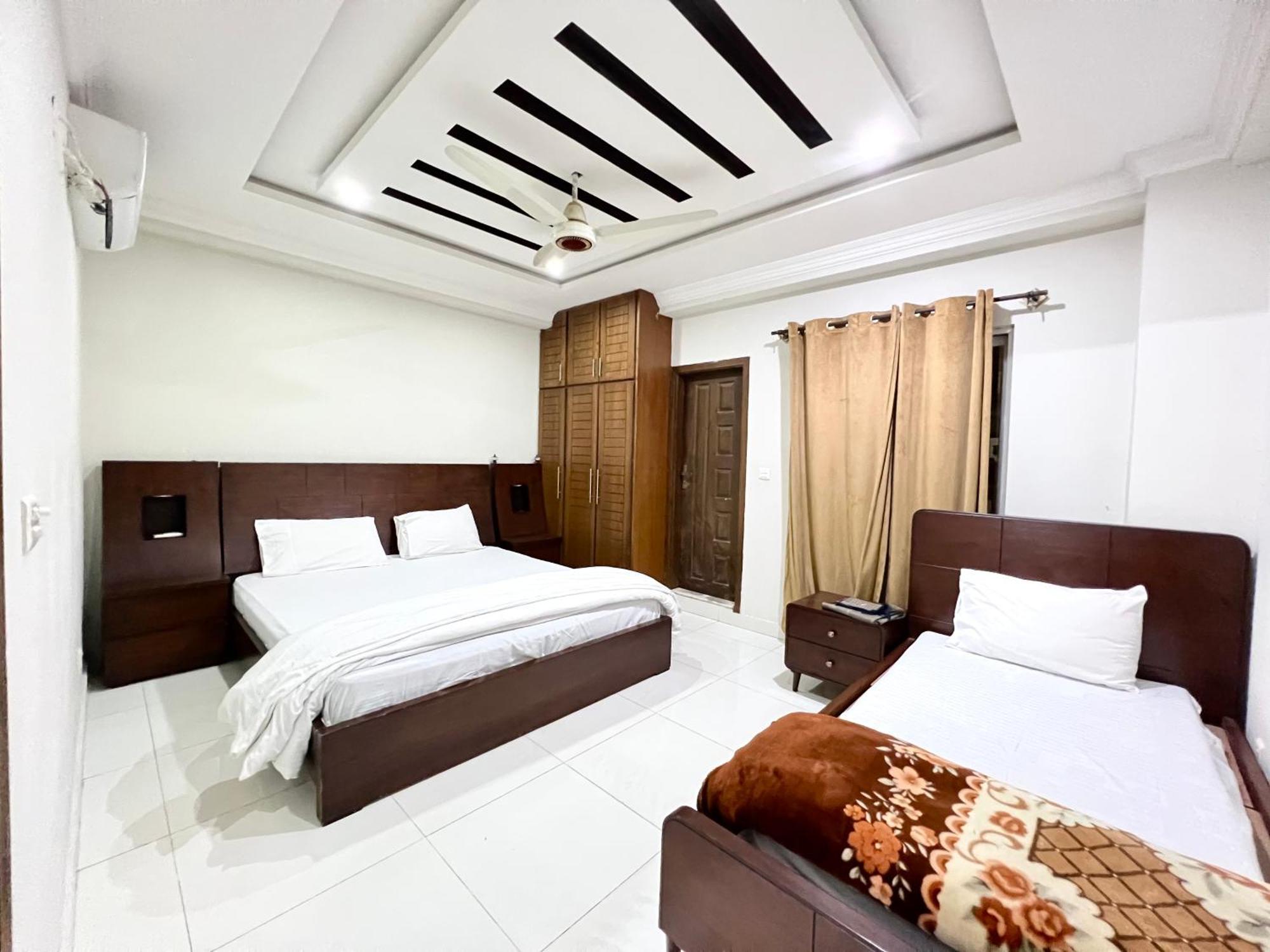 Luxury Apartment Rentals Исламабад Экстерьер фото